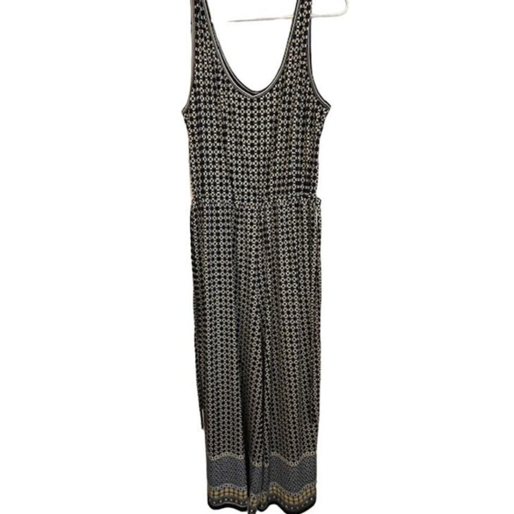 Max Studio women's knit jumpsuit in navy blue and yellow.